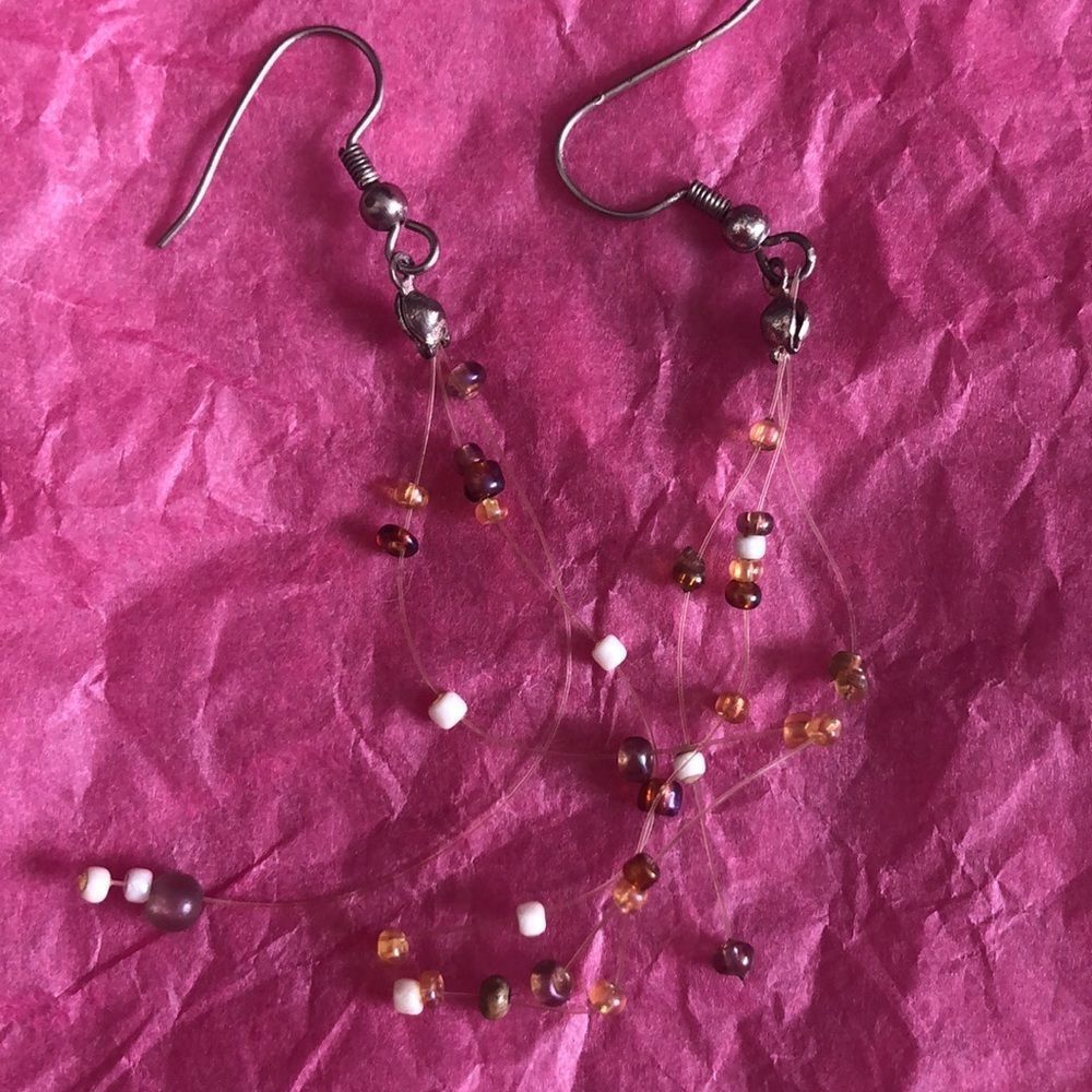 White purple orange beaded dangling wire earrings
